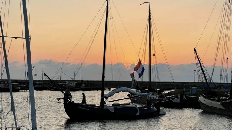Sailing boat at sunset